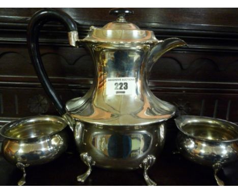 A Three Piece Silver-Plate Tea Service.