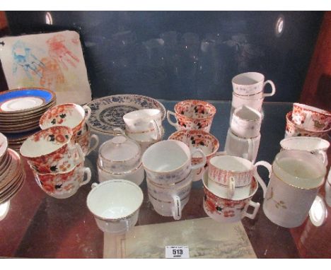 A Shelf of Assorted Ceramics to include Victorian teacups, blue and enamelled tea plates, etc.