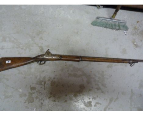A Reproduction Hammer Action Musket.