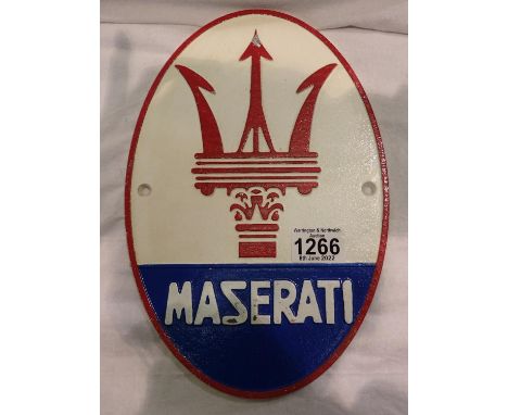 Cast iron Maserati sign, H: 29 cm. P&amp;P Group 2 (£18+VAT for the first lot and £3+VAT for subsequent lots) 