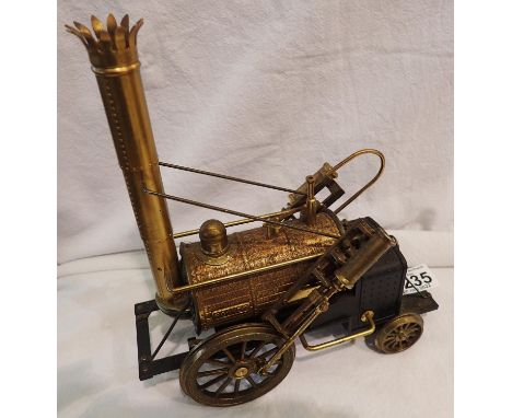 Vintage brass model of Stephenson's rocket locomotive with built in transistor radio. working at lotting. P&amp;P Group 1 (£1