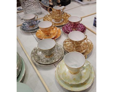 Eighteen piece tea set in multi colours. Not available for in-house P&amp;P, contact Paul O'Hea at Mailboxes on 01925 659133 