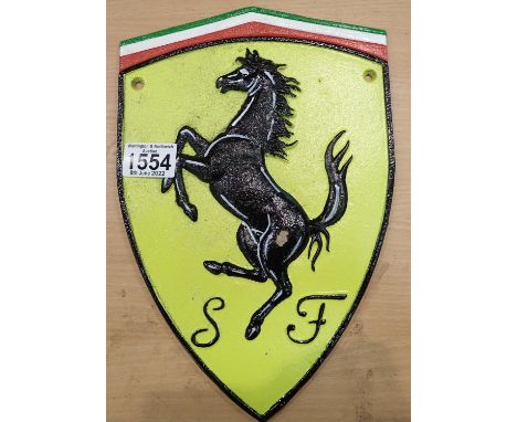 Cast iron Ferrari wall plaque.  P&amp;P Group 2 (£18+VAT for the first lot and £3+VAT for subsequent lots) 