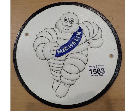 Cast iron Michelin Man running sign.  P&amp;P Group 2 (£18+VAT for the first lot and £3+VAT for subsequent lots) 