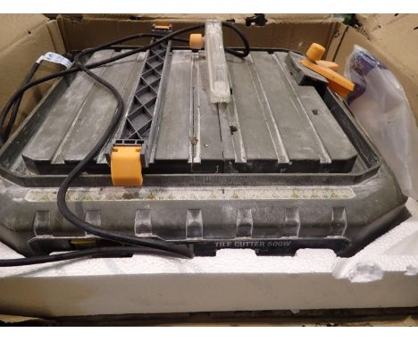 Boxed Titan tile cutter. Not available for in-house P&amp;P, contact Paul O'Hea at Mailboxes on 01925 659133 