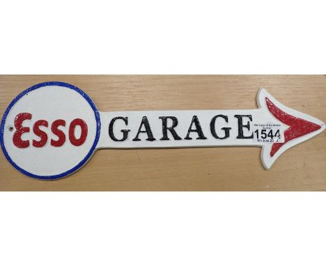 Cast iron Esso Garage arrow sign, 30 x 10 cm. P&amp;P Group 2 (£18+VAT for the first lot and £3+VAT for subsequent lots) 