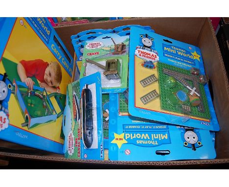 A large quantity of Ertl Thomas the Tank Engine & Friends carded diecast vehicles and playsets to include Thomas Miniworld Ca