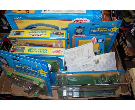 A box of Ertl Thomas the Tank Engine & Friends diecast vehicles and playsets to include Thomas Miniworld Harold & Toby