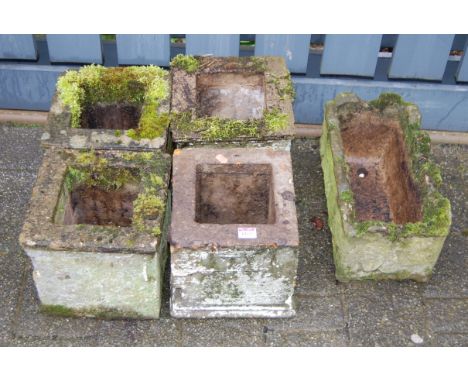 A set of four reconstituted stone square section pedestals; together with a small plant trough (5)