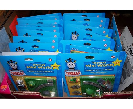 A large quantity of Ertl Thomas the Tank Engine & Friends miniworld carded playsets to include Percy and Station