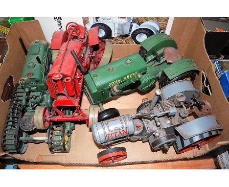 A collection of modern release tinplate tractor models to inc. John Deere and others