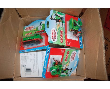 Four various Ertl incomplete trade boxes containing various Thomas the Tank Engine carded diecast locomotives to include Duck