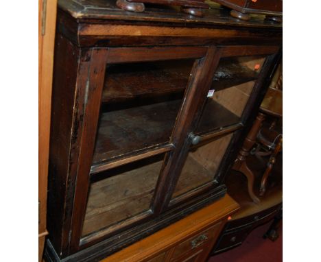 A late 19th century stained oak double door display cabinet, w.90cm