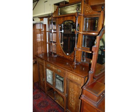 A late Victorian Sheraton Revival rosewood floral satinwood and bone inlaid mirror back side cabinet, the central bevelled sh