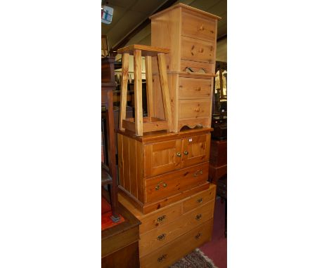 A collection of modern pine bedroom furniture, to include; chest of two short over two long drawers, double door low side cup