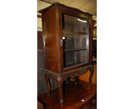 An Edwardian stained beech single door glazed music cabinet, w.62.5cm