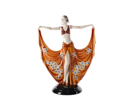 GOLDSCHEIDER POTTERY ART DECO FIGURE OF A LADY, BY DAKON, modelled holding the hem of her skirt with arms raised and head tur