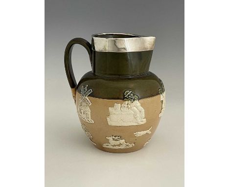 A Doulton Lambeth sprigged stoneware jug, silver mounted, green and salt glazed with applied hunting and tavern scenes, 19cm 