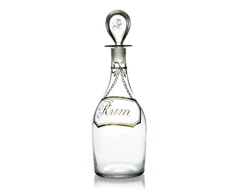 A George III gilt glass spirit decanter, circa 1780, tapered form, decorated with a painted bottle label for Rum, the lozenge