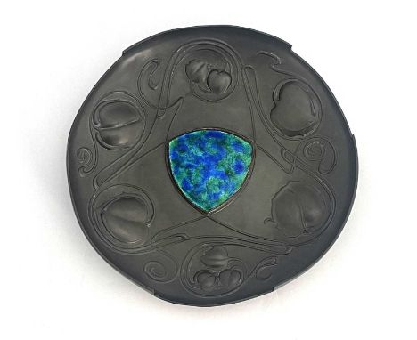 Archibald Knox for Liberty and Co., a Tudric Arts and Crafts pewter and enamelled dish, model 044, the central triangular pla