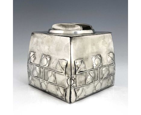Archibald Knox for Liberty and Co., a large Tudric Arts and Crafts pewter biscuit barrel, model 0194, bowed cuboid form, reli