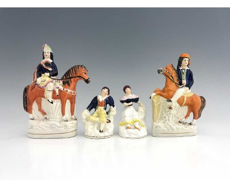 A Staffordshire figure group, circa 1850, modelled as two figures mounted on horseback, likely to be representations of royal