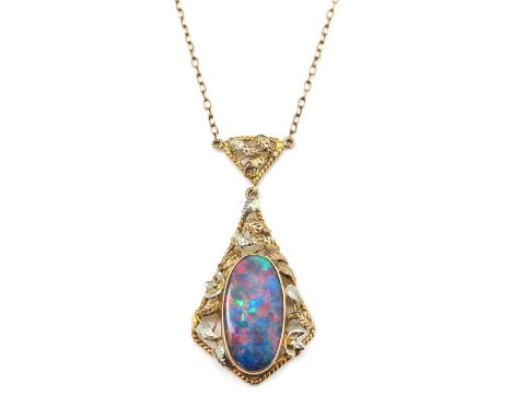 Rhoda Wagner (attributed), an Arts and Crafts 9 carat gold and opal pendant, H P, the oval stone within a diamond form ropetw