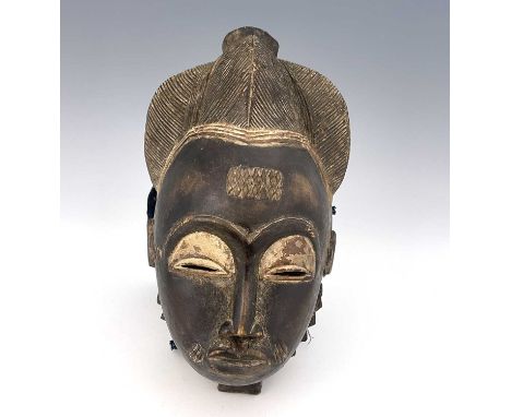 Tribal Interest, Baule Tribe, a portrait mask, 33cm high