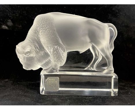 Lalique, a Bison glass paperweight, model 1196, designed circa 1931, polished and frosted, incised mark, Lalique France, orig