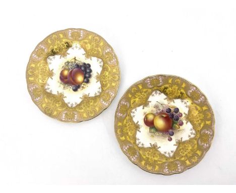 Edward Townsend and John Freeman for Royal Worcester, a pair of fruit painted cabinet plates, circular lobed form, circa 1957
