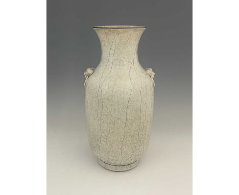 A Chinese twin handled vase, shouldered rouleau form, white oatmeal textured craquelure glaze with relief moulded dog mask an