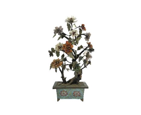 A large Chinese 'Bonsai' tree, Qing Dynasty, hardstone flowers, and jade foliage, in a rectangular cloisonne planter raised o