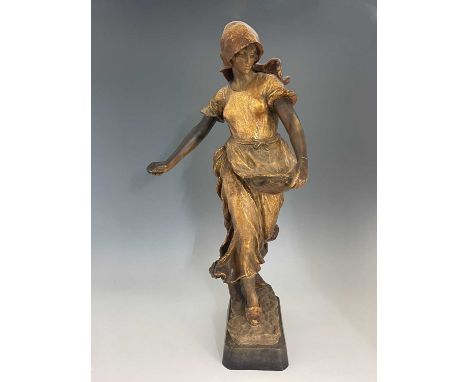 Goldscheider, figure of a Dutch woman, highlighted in gilt, impressed marks and numbered 1935 1744 2 86cm high