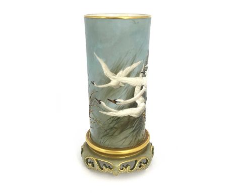 Charles Baldwyn for Royal Worcester, a cylinder vase, 1904, on integrated Oriental pierced scroll bracket stand, painted with