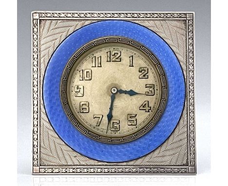 An Art Deco silver and enamelled clock, Turner and Simpson, Birmingham 1928, square section, engine turned with blue guilloch