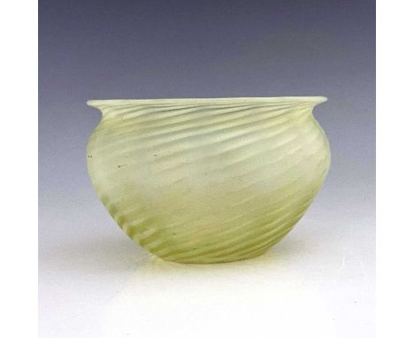 An Arts and Crafts opalescent glass light shade, probably James Powell and Sons for W A S Benson, squat poppy head form, wryt