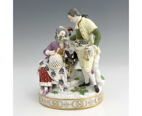 A Meissen figure group, model G22, after Michel Victor Acier, late 19th century, modelled as a courting couple, the man with 