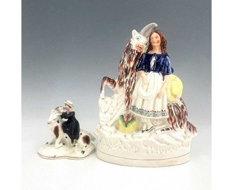 Staffordshire figures of royal children with goats, circa 1850, modelled as a royal portrait of the Princess Royal (Victoria 