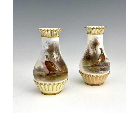 James Stinton for Royal Worcester, a pair of pheasant painted vases, 1904, baluster form, relief moulded lappet bases and ret