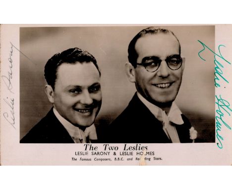 The Two Leslies signed vintage black and white postcard, approx 6x4. Leslie Sarony (1897 1985) and Leslie Holmes (1901 1960) 