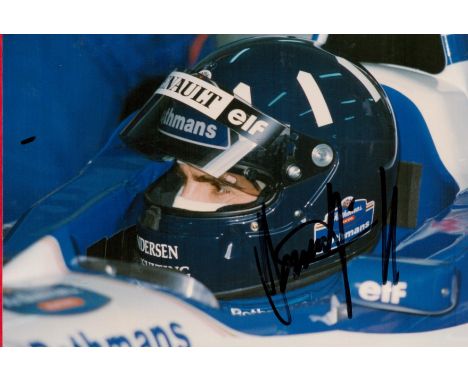 F1 Legend Damon Hill Hand signed 6x4 Colour Photo. Photo shows Hill in his Race Car wearing uniform. Fantastic signature. Goo