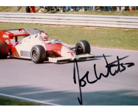 F1 Racer John Watson Hand signed 5x4 Colour Photo of his Race car on the track. Fantastic signature,. Good condition. All aut