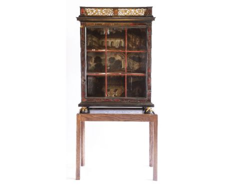 A Continental ebony and red tortoiseshell glazed display cabinet,  r18th century, having a cast metal gallery over an astraga