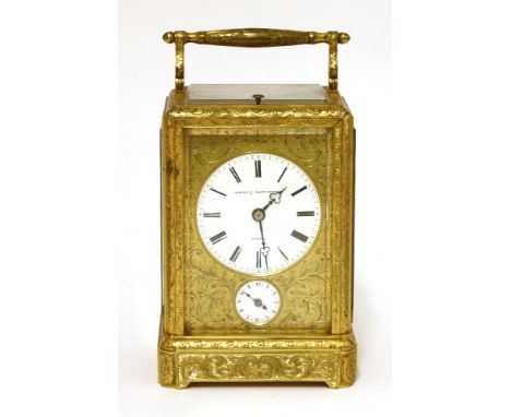 A French engraved gilt brass cased carriage clock,by Albert & Klaftenberger, Genève, with a push button repeater and alarm,wi