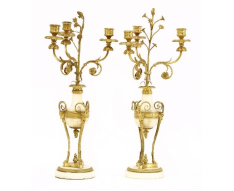 A pair of George III ormolu and white marble three-light candelabra, in the manner of Matthew Boulton (2)