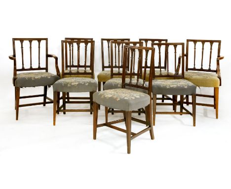 A set of nine George III mahogany dining chairs, each with moulded frames, arrow splat backs, overstuffed and serpentine fron