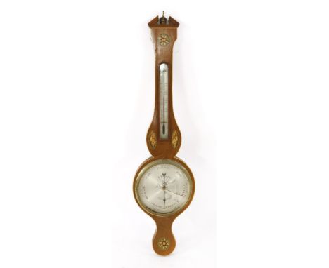 A George III strung and inlaid mahogany wheel barometer,by A Pagane, Gainsborough, with a silvered dial and thermometer,98cm 