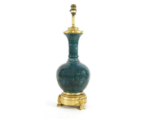 A Théodore Deck style table lamp, of baluster form, pottery and gilt metal mounted, glazed in turquoise blue and decorated wi