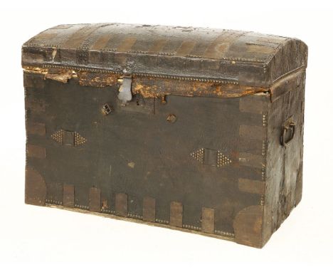 A royal leather-clad trunk, late 18th century, the dome-topped iron-bound chest having brass studwork to the top and front an