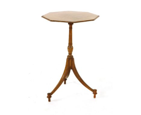 A satinwood tripod lamp table,19th century, with an octagonal snap top,45.5cm diameter70.5cm high